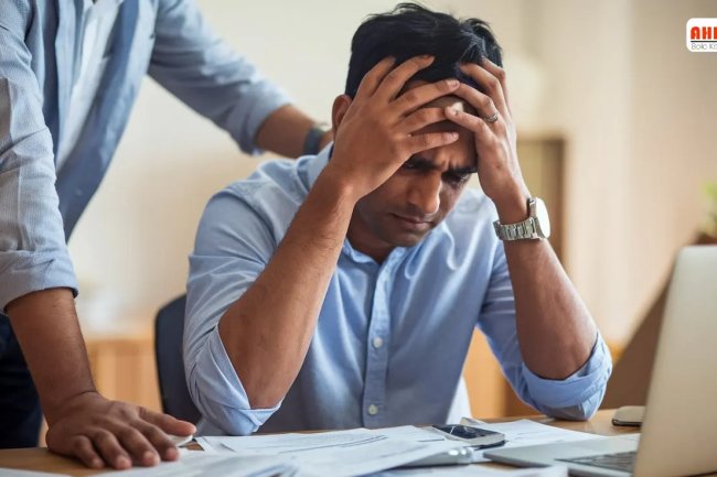 Loan Recovery Agents and the Rising Stress of EMIs: Find Relief with AHK TIPS